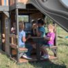 Backyard Discovery Canyon Creek Cedar Wood Swing Set with Wave Slide, Clubhouse, Play Kitchen, Picnic Area, Belt Swings, Web Swing, Rock Wall, Balconies, Playhouse, Step Ladder, Outdoor Playset - Image 22