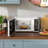 Mainstays 0.7 cu. ft. Countertop Microwave Oven, 700 Watts, White, New - Image 6