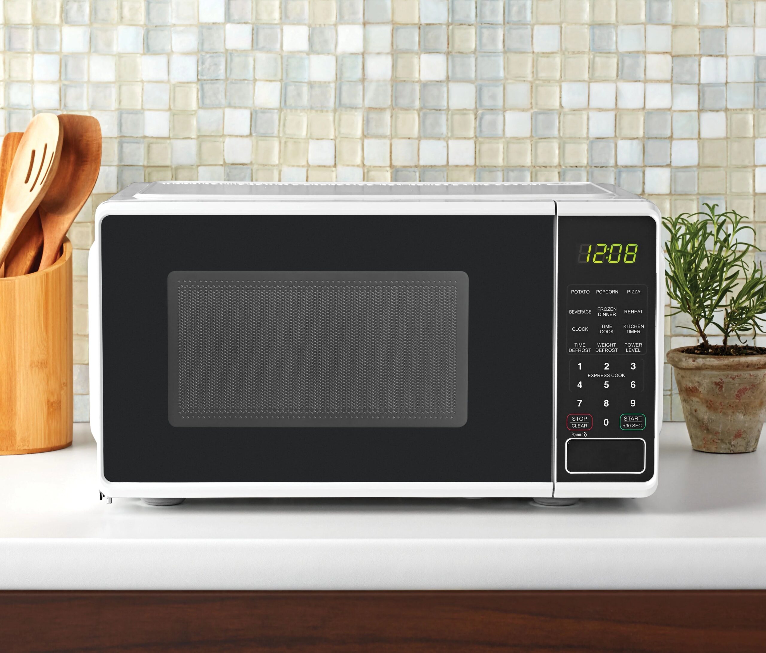Mainstays 0.7 cu. ft. Countertop Microwave Oven, 700 Watts, White, New - Image 11