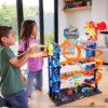 Hot Wheels City Ultimate Garage Playset with 2 Die-Cast Cars, Storage for 50+ Cars Child Age 4-8 - Image 2