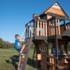 Backyard Discovery Canyon Creek Cedar Wood Swing Set with Wave Slide, Clubhouse, Play Kitchen, Picnic Area, Belt Swings, Web Swing, Rock Wall, Balconies, Playhouse, Step Ladder, Outdoor Playset - Image 21
