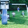 Backyard Discovery Canyon Creek Cedar Wood Swing Set with Wave Slide, Clubhouse, Play Kitchen, Picnic Area, Belt Swings, Web Swing, Rock Wall, Balconies, Playhouse, Step Ladder, Outdoor Playset - Image 16